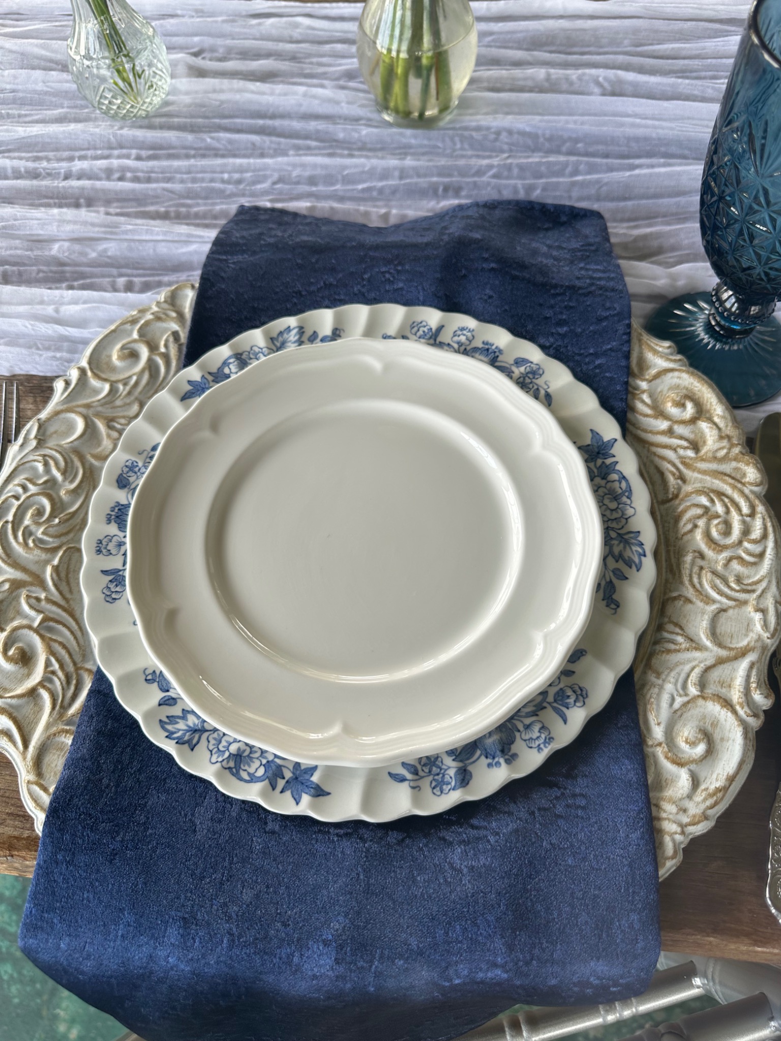 Blue and white vintage-inspired wedding place setting